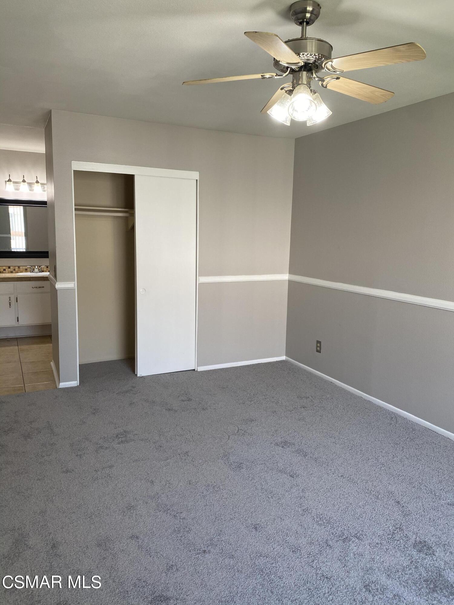 1778 Sinaloa Road, Unit 298 Simi Valley, CA 93065 - Photo 26 of 43 a view of a big room with chandelier fan and windows