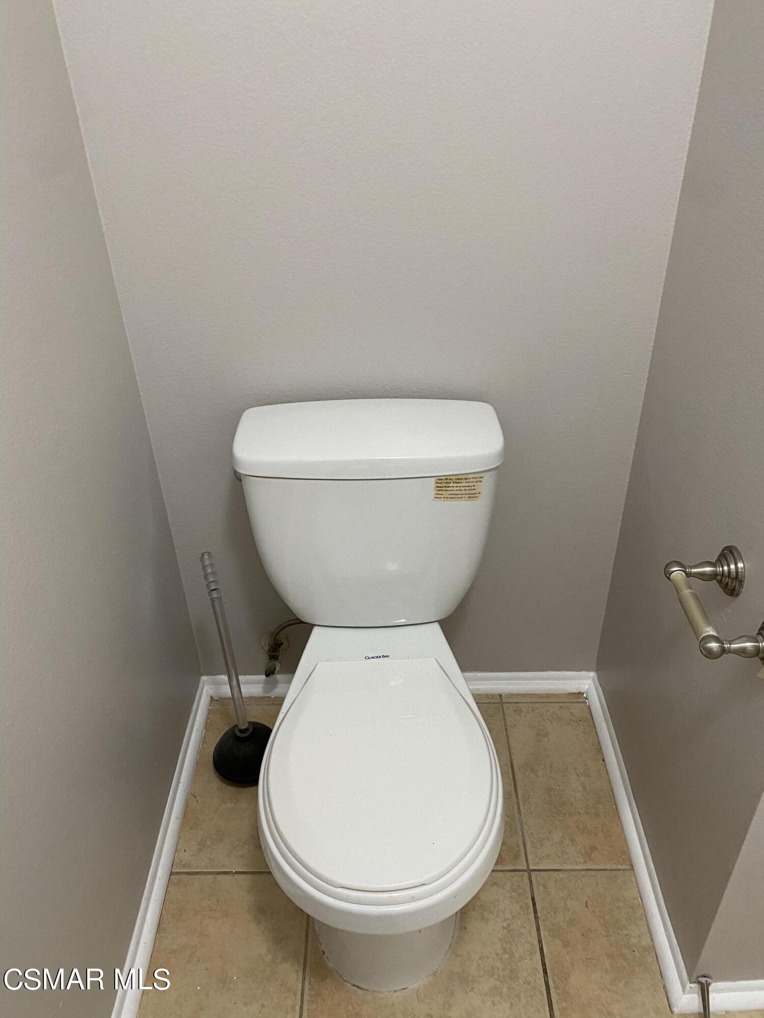 1778 Sinaloa Road, Unit 298 Simi Valley, CA 93065 - Photo 33 of 43 a white toilet sitting next to a white sink