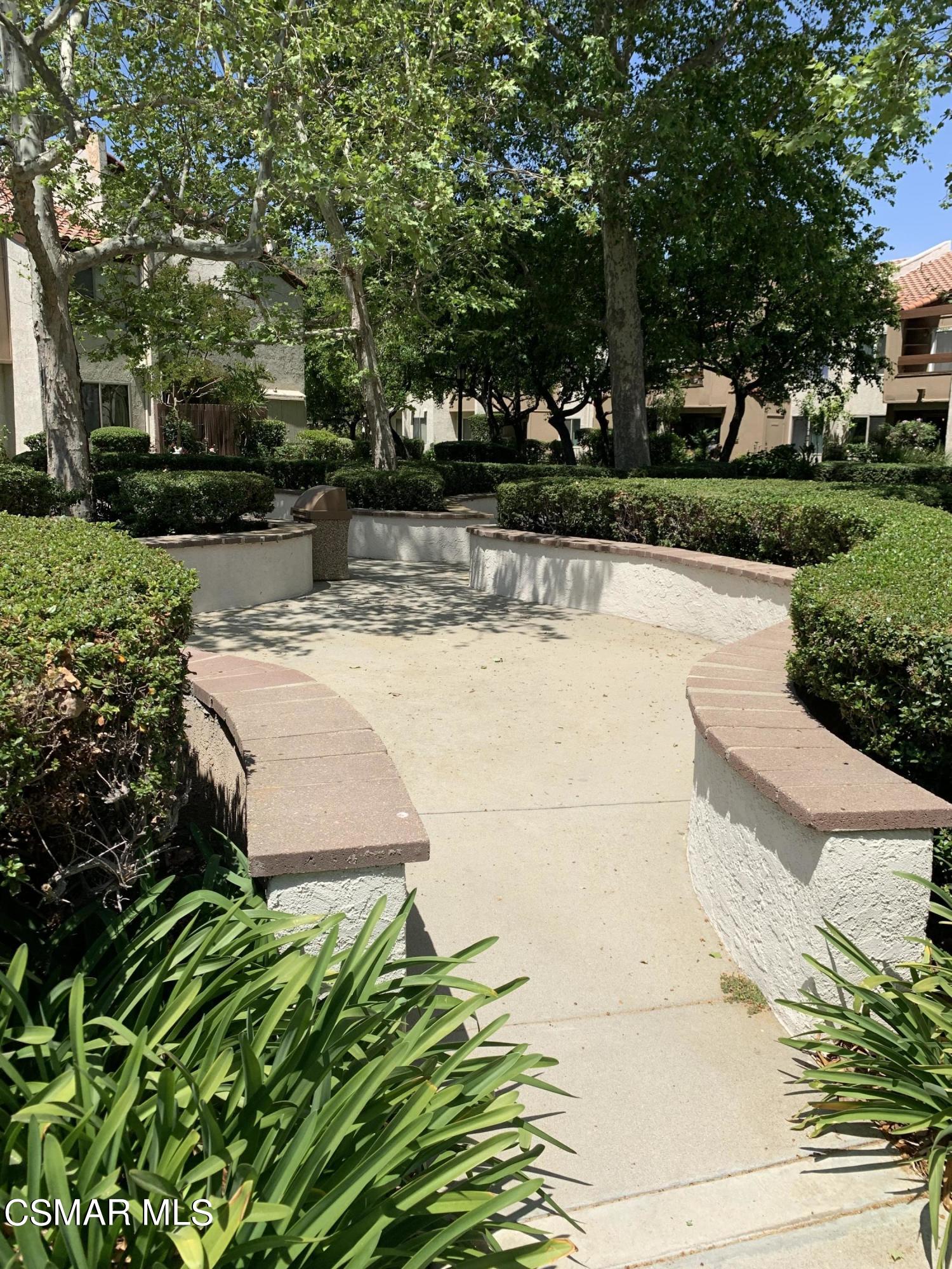 1778 Sinaloa Road, Unit 298 Simi Valley, CA 93065 - Photo 42 of 43 a view of a yard with plants and trees