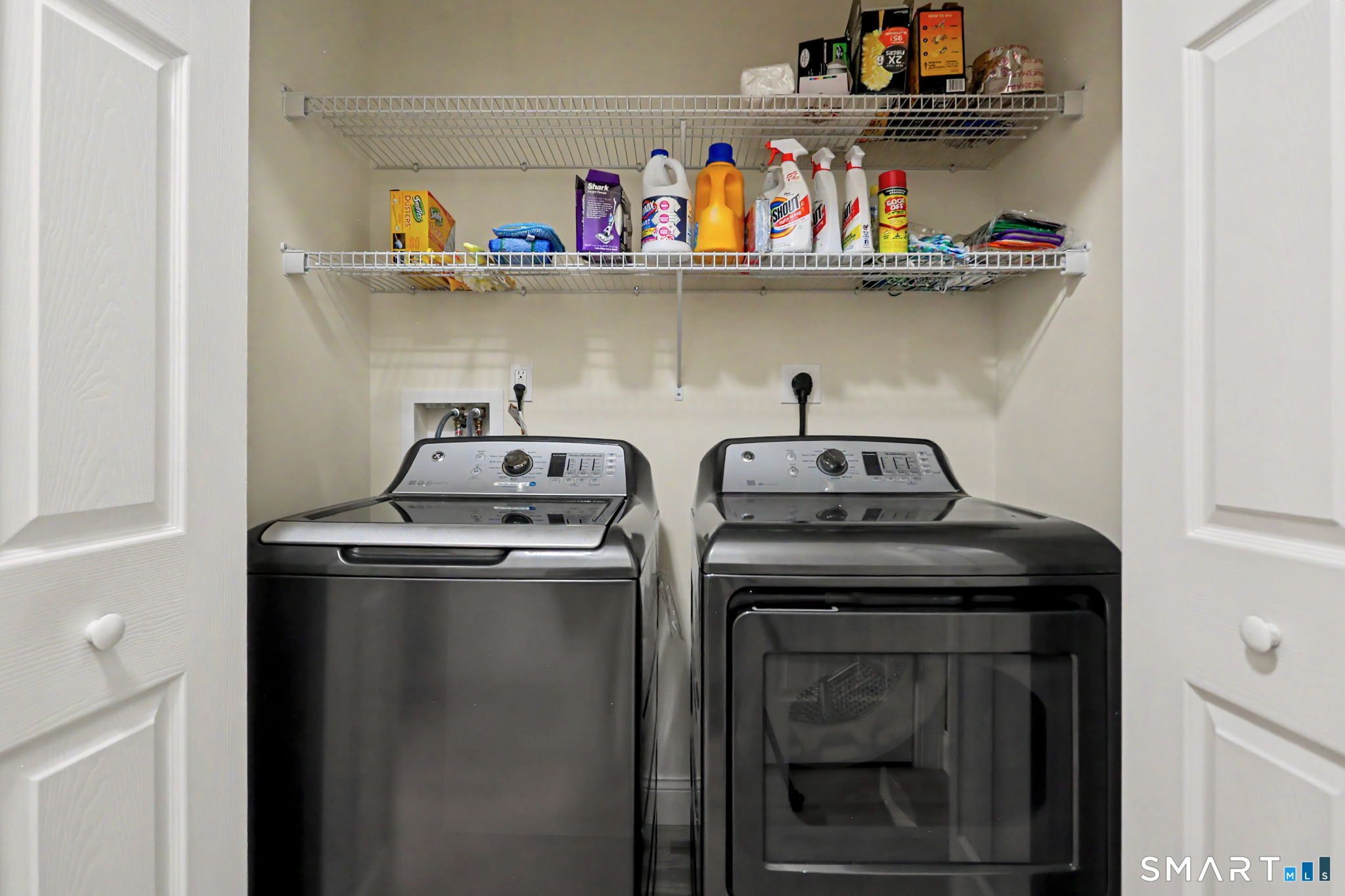 223 Meadow Brook Road, Unit 223 Oxford, CT 06478 - Photo 23 of 34 a utility room with dryer and washer