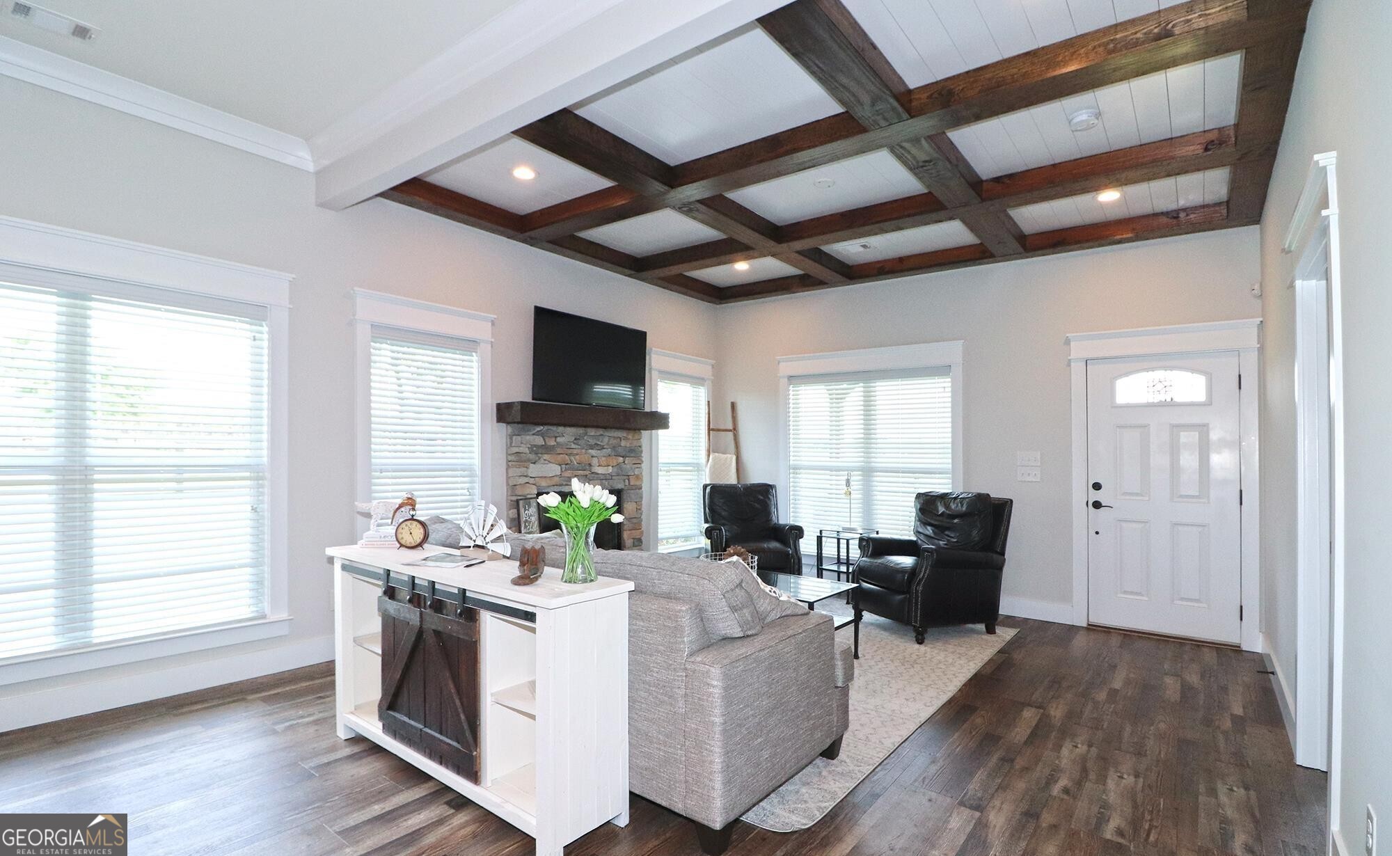1603 Boutwell Road Perry, GA 31069 - Photo 17 of 96 a living room with fireplace furniture and a flat screen tv