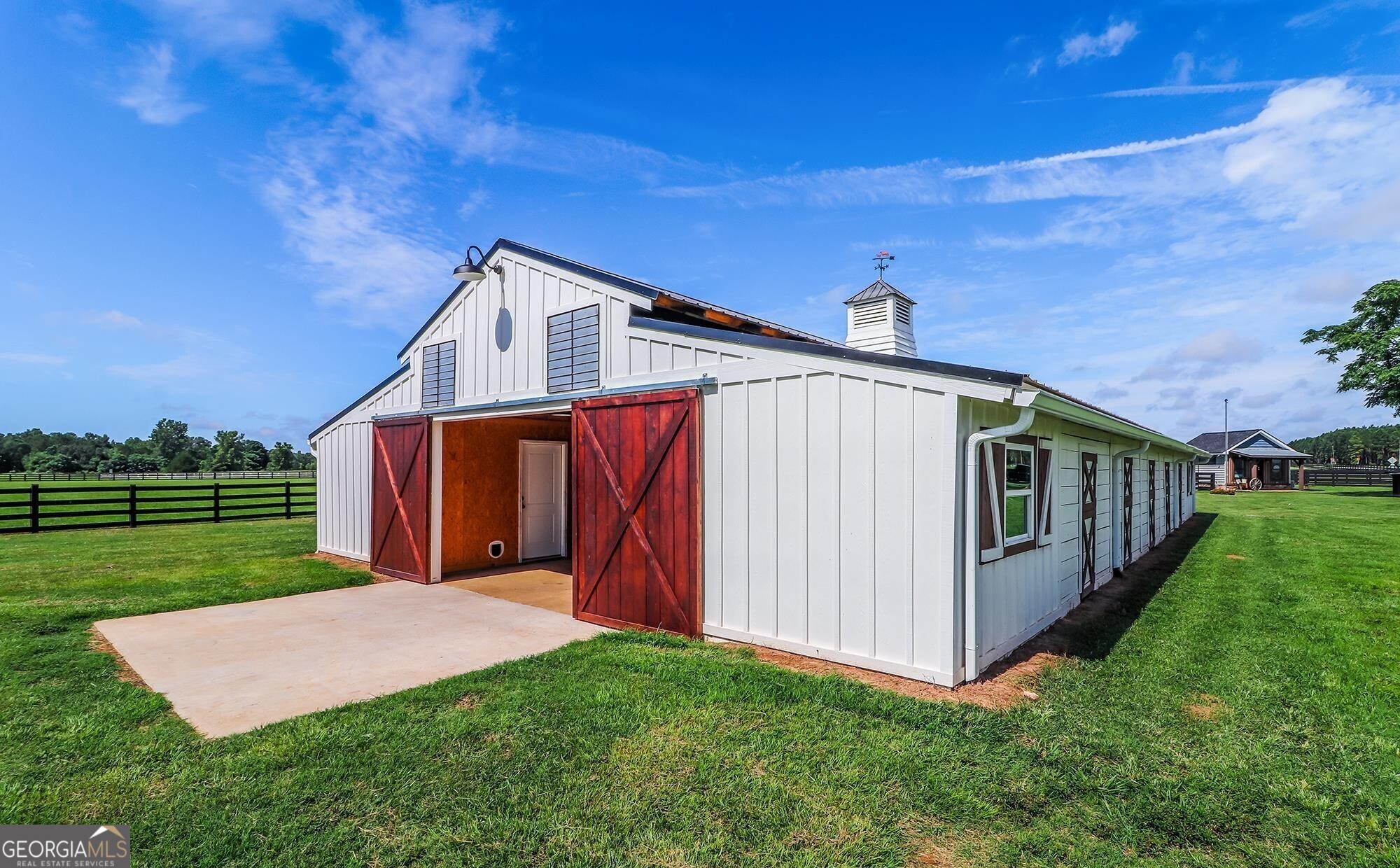 1603 Boutwell Road Perry, GA 31069 - Photo 28 of 93 Perfect for weddings, parties, or creative events, the barn elevates the property's appeal.