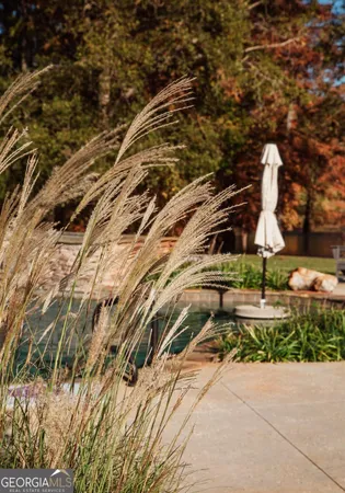 a spacious bedroom with a bed and a dresser