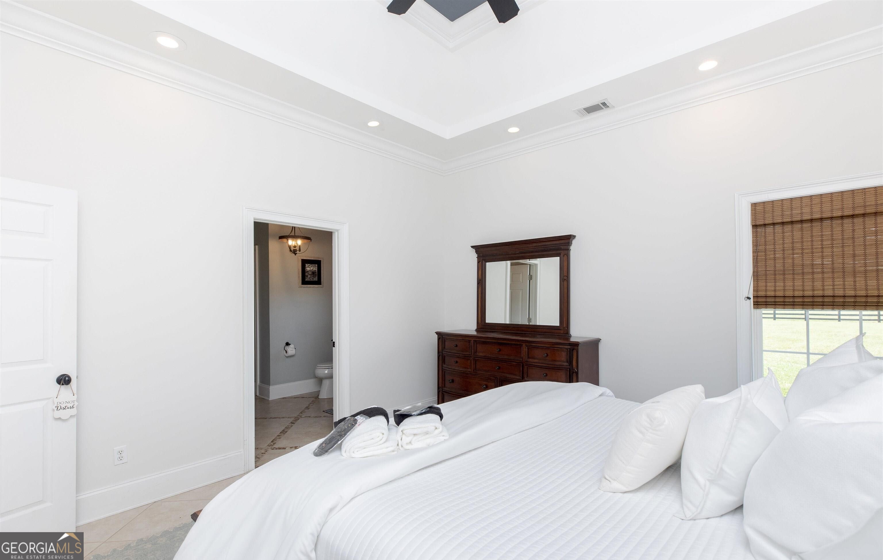 1603 Boutwell Road Perry, GA 31069 - Photo 88 of 96 a bedroom with a bed and a dresser