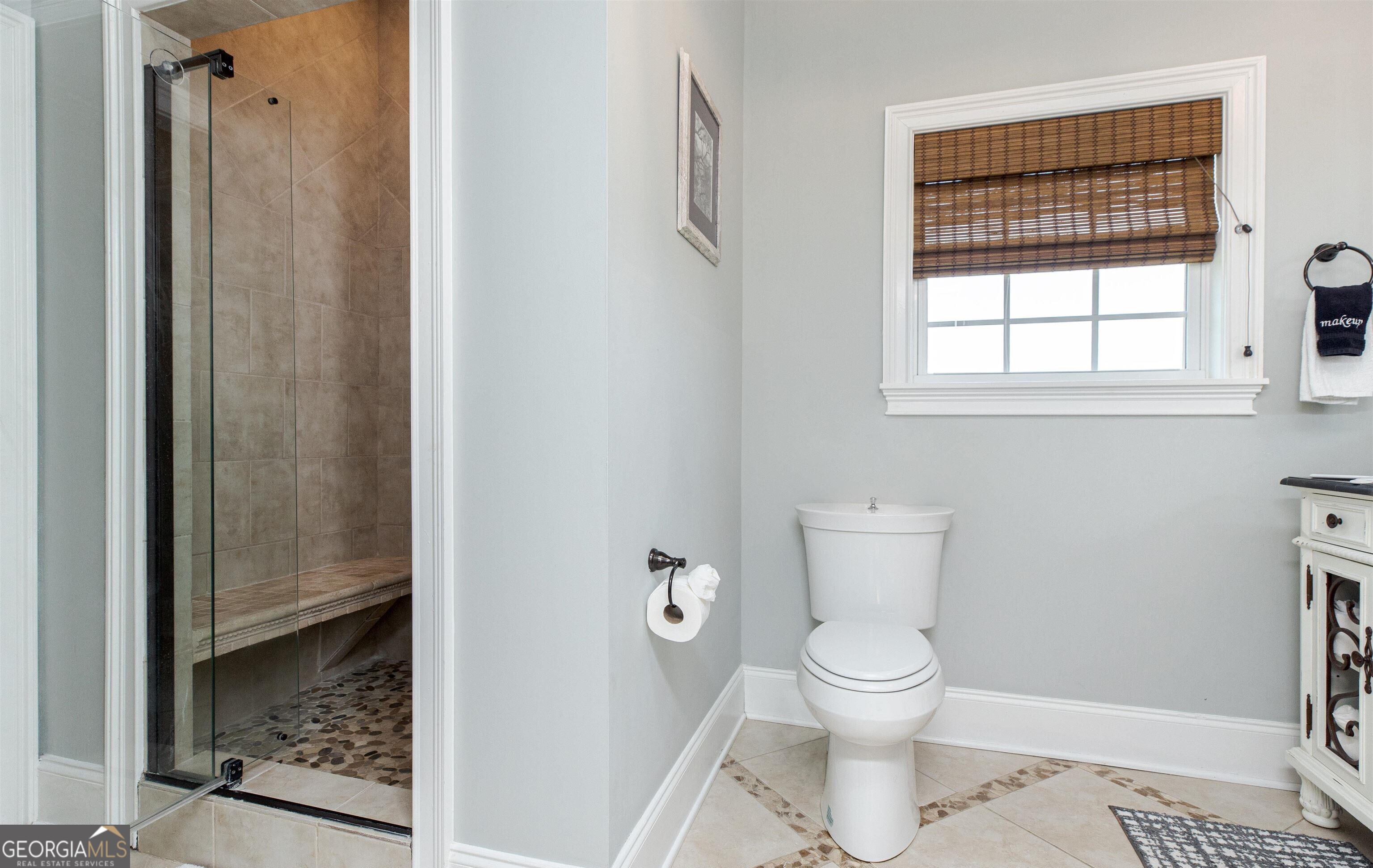1603 Boutwell Road Perry, GA 31069 - Photo 91 of 96 a bathroom with a toilet and a shower