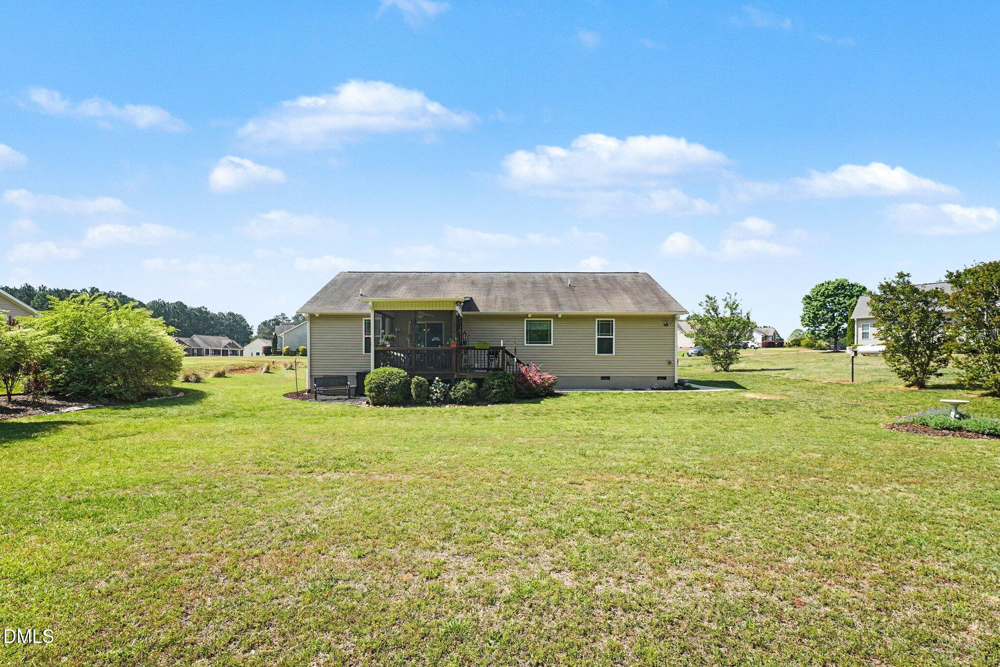 109 His Way Middlesex, NC 27557 - Photo 16 of 21 a house view with a garden space