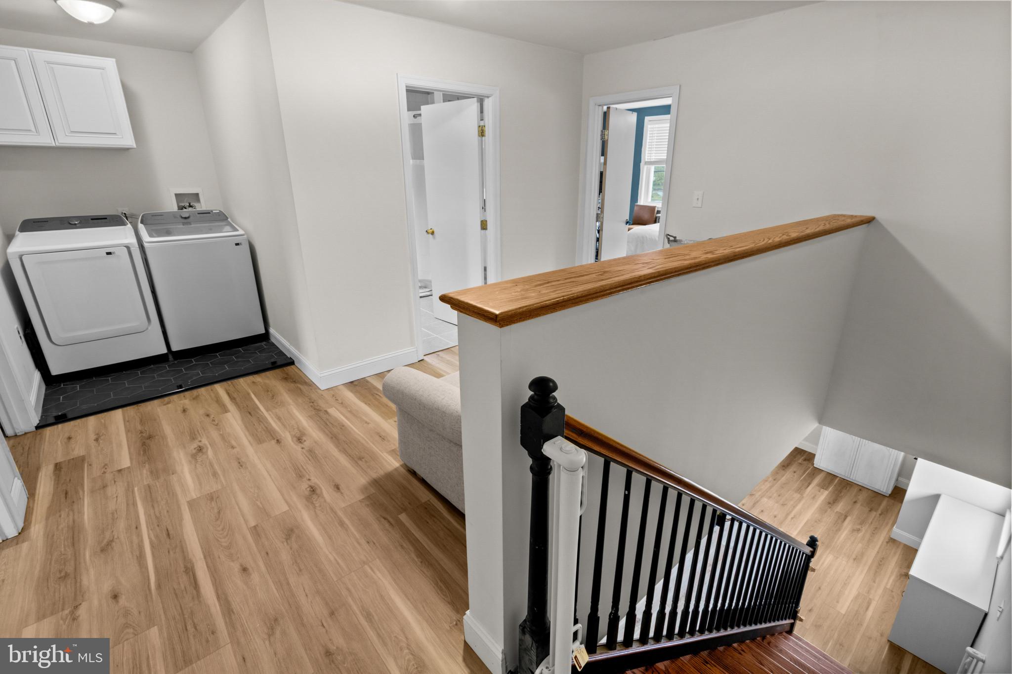 529 Ridge Road Southampton, NJ 08088 - Photo 13 of 25 a view of a hallway with entryway wooden floor and front door