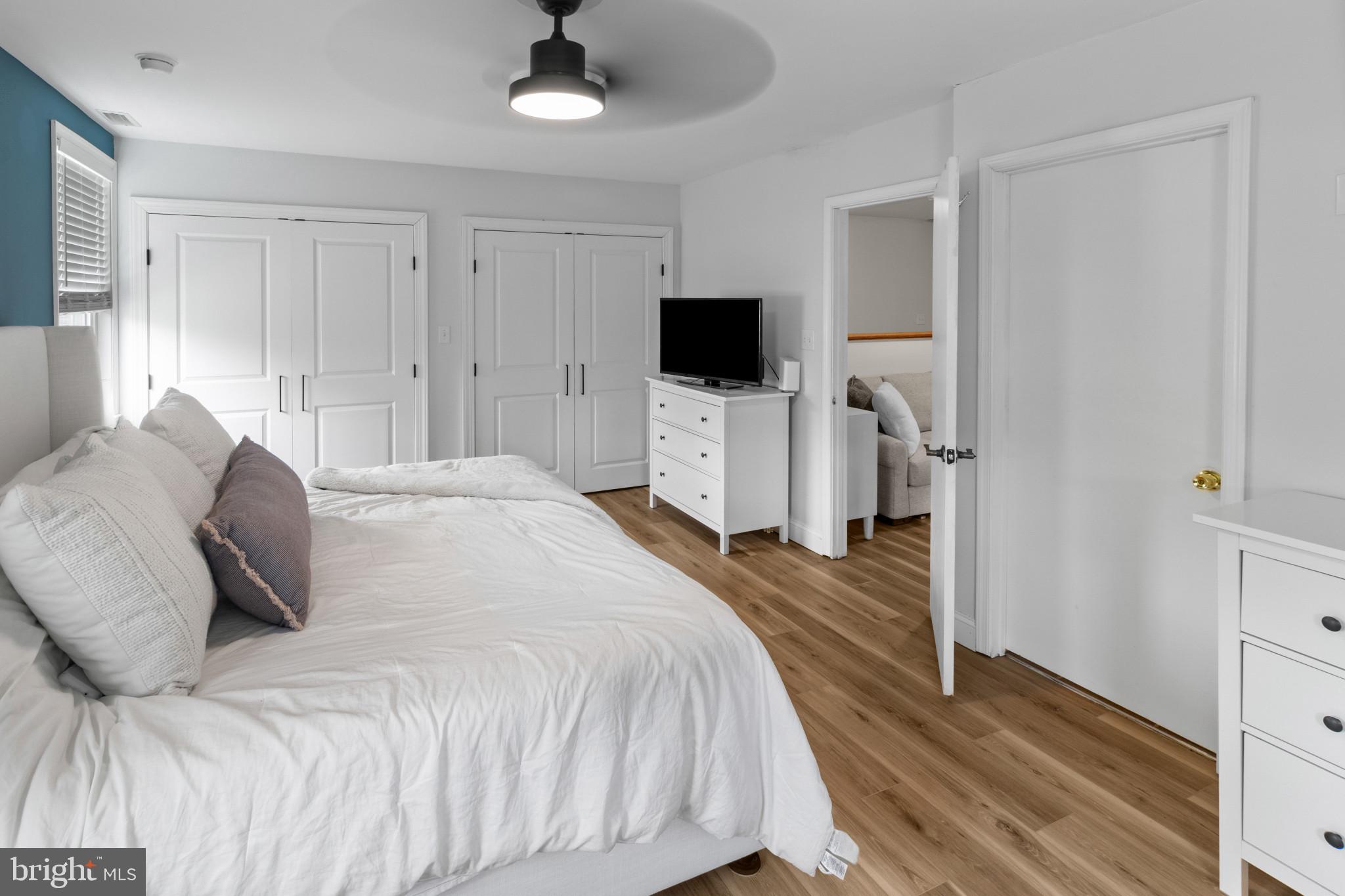 529 Ridge Road Southampton, NJ 08088 - Photo 17 of 25 a bedroom with a bed and a flat screen tv