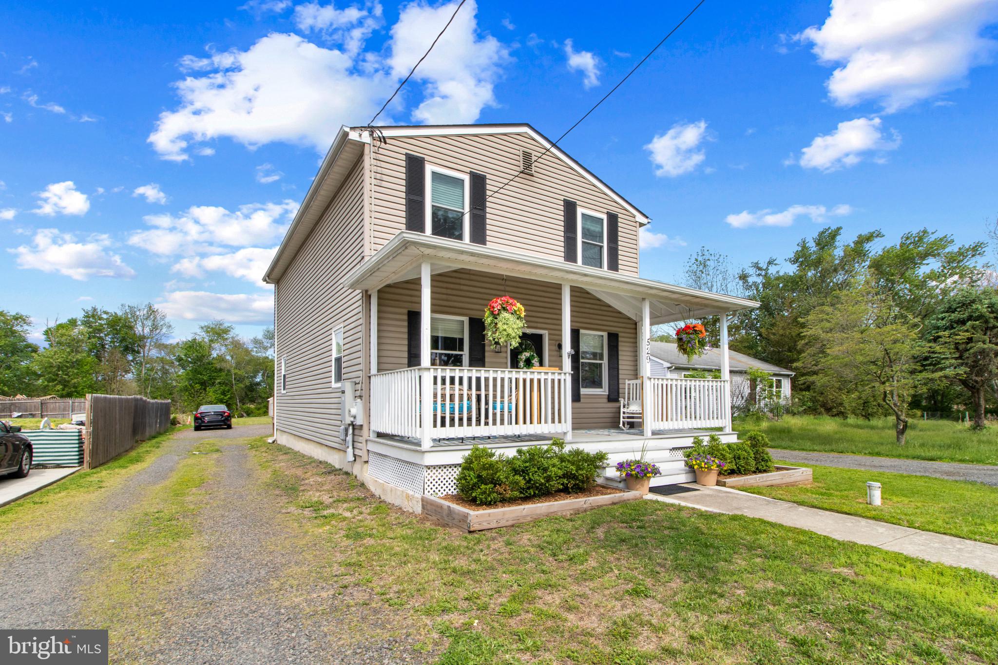 529 Ridge Road Southampton, NJ 08088 - Photo 2 of 25 a front view of a house with a yard