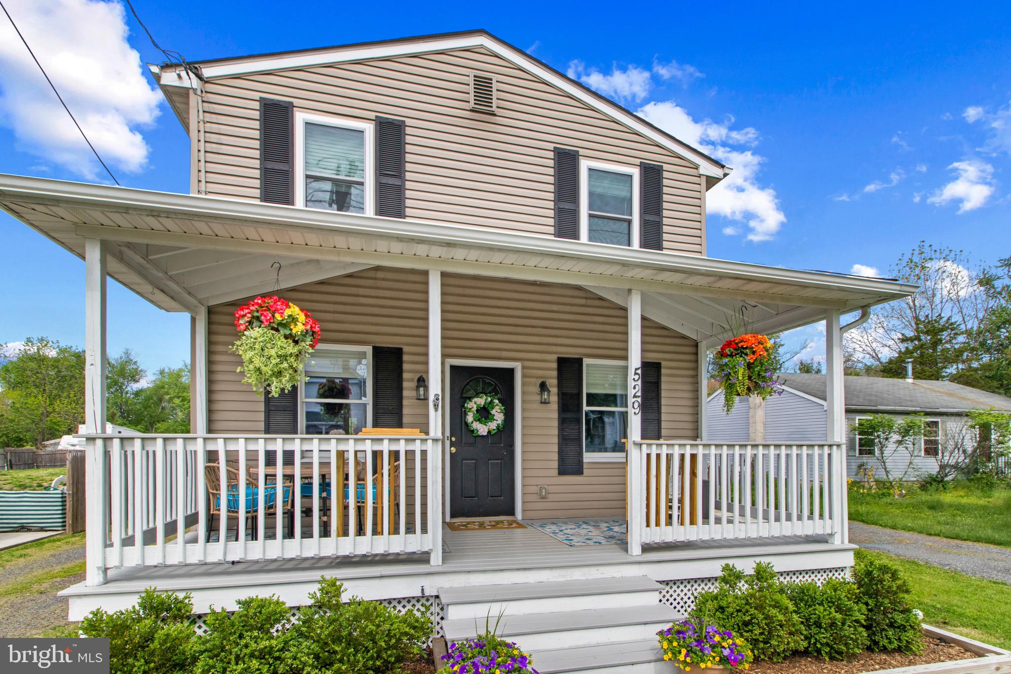 529 Ridge Road Southampton, NJ 08088 - Photo 4 of 25 a front view of a house with a porch