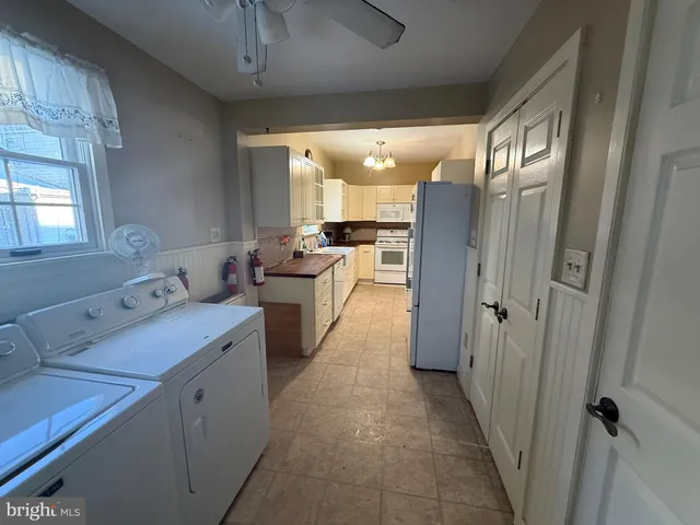 a view of a kitchen with a sink