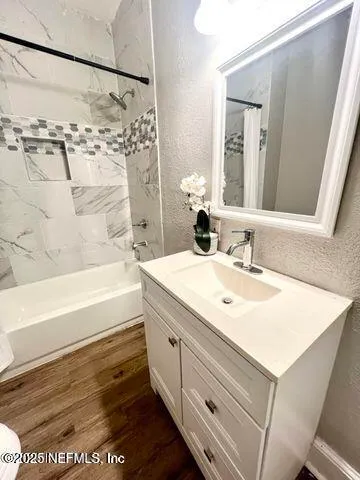 a bathroom with a sink and a bathtub