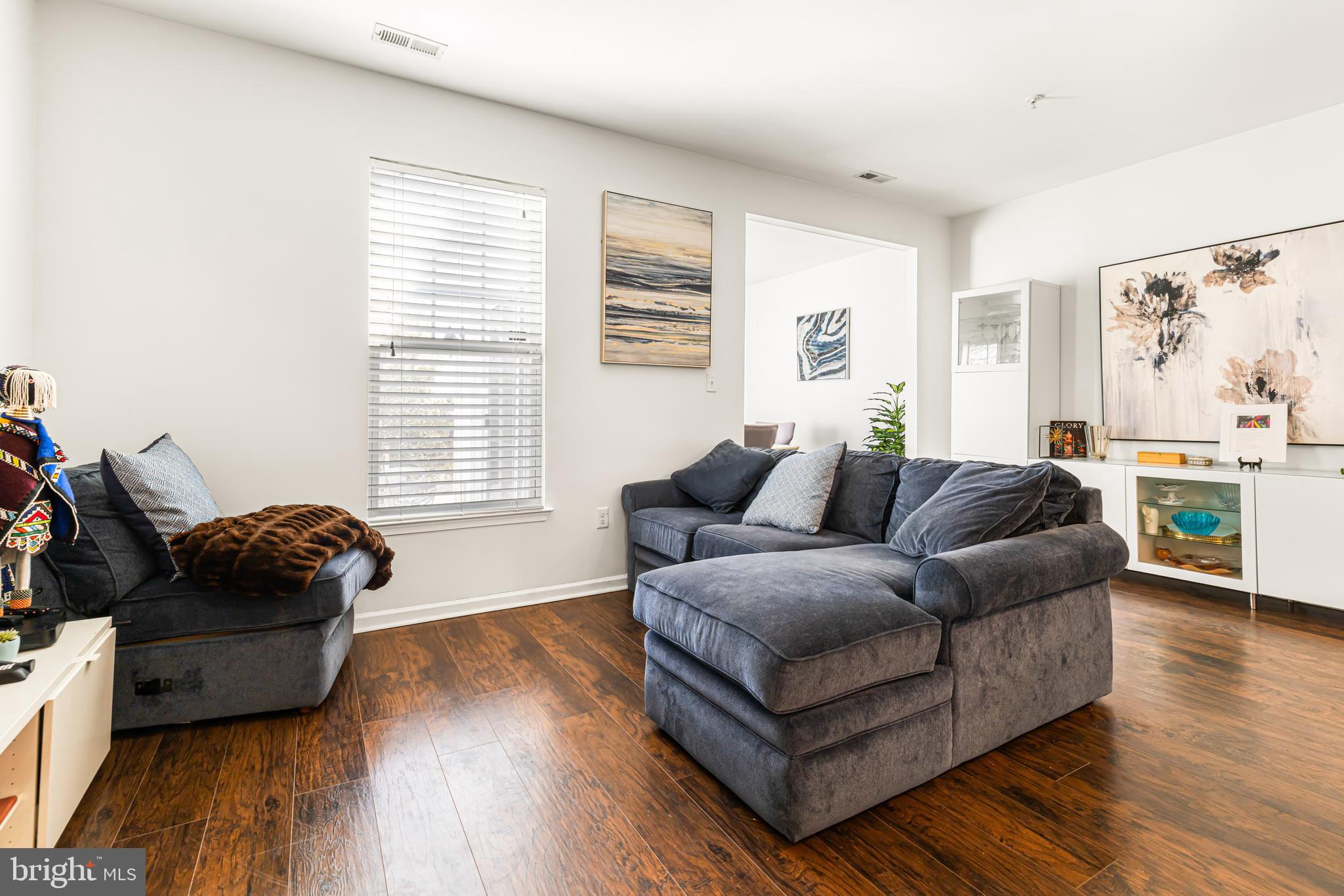 303 Ross Court Wyncote, PA 19095 - Photo 6 of 26 Open‑concept living room with hardwood flooring