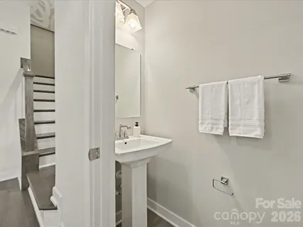 a bedroom with a large bed and a couch