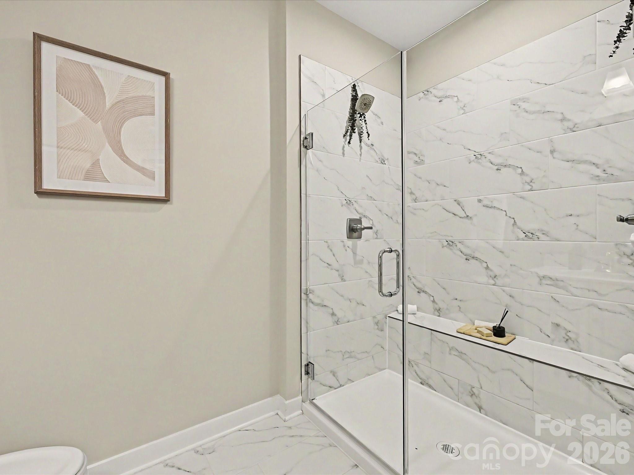653 Uwharrie River Road Charlotte, NC 28211 - Photo 18 of 29 a bathroom with a shower