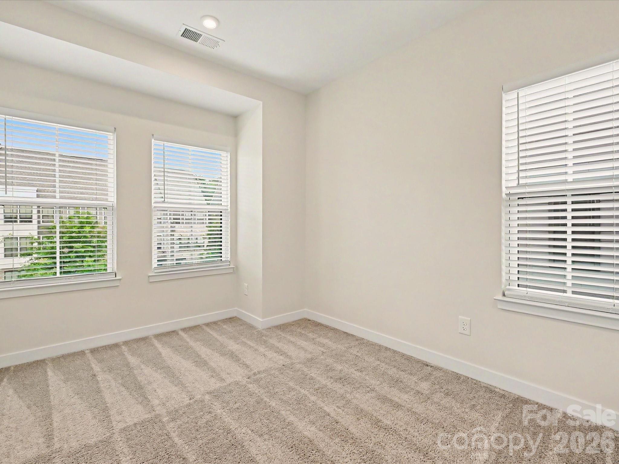 653 Uwharrie River Road Charlotte, NC 28211 - Photo 21 of 29 a view of an empty room with a window