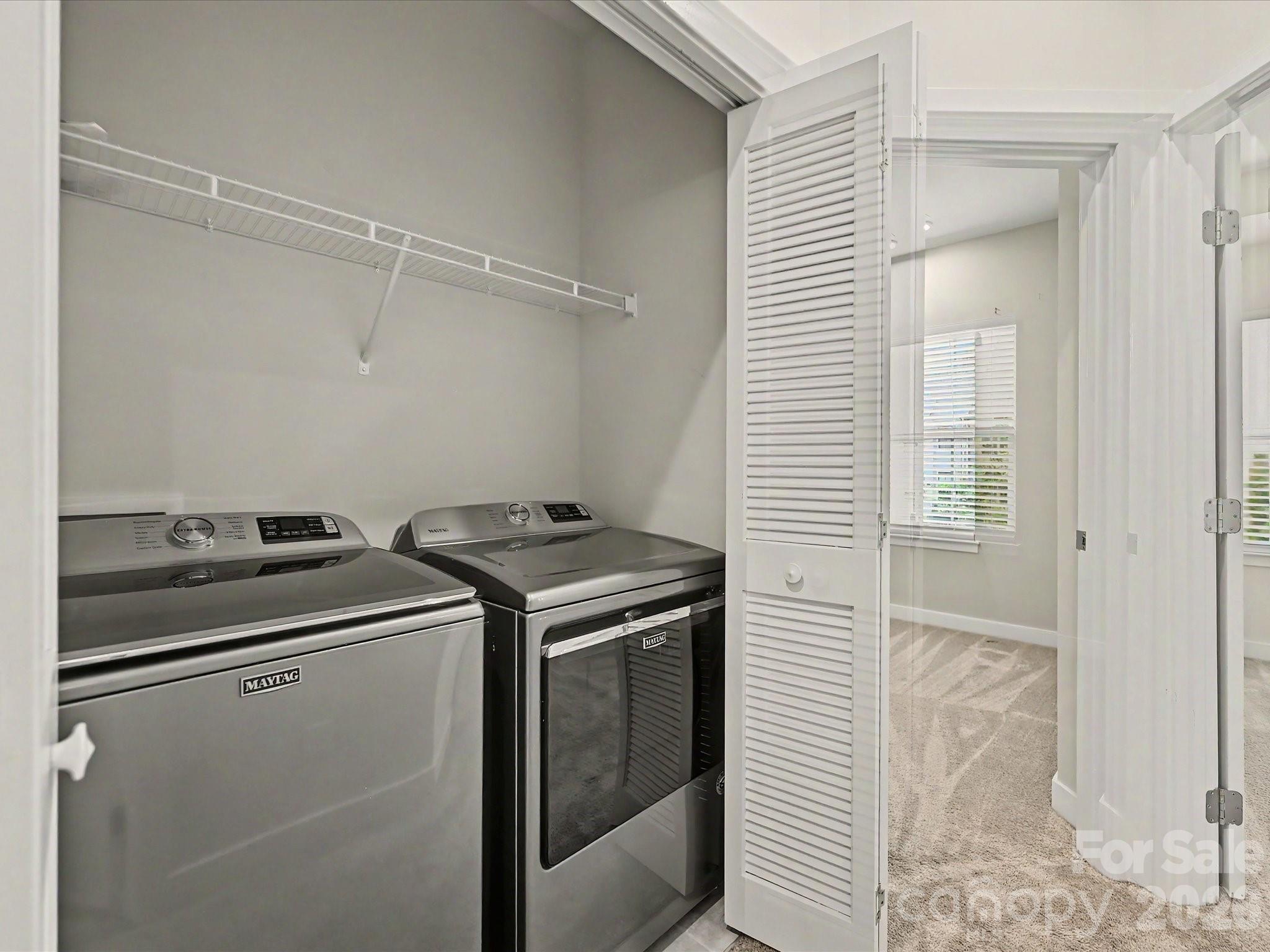 653 Uwharrie River Road Charlotte, NC 28211 - Photo 23 of 29 a utility room with dryer and washer