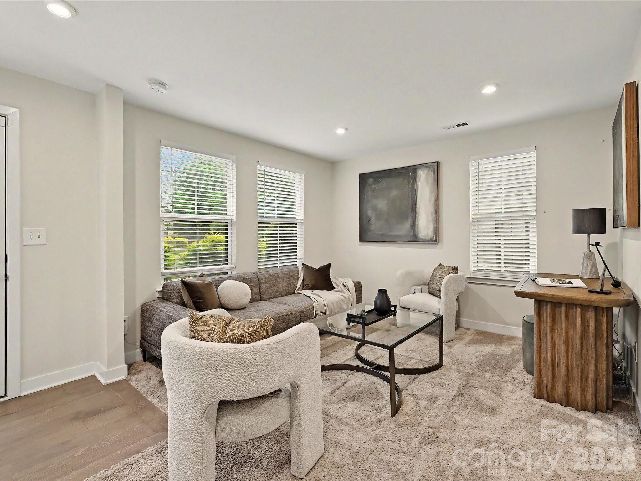 653 Uwharrie River Road Charlotte, NC 28211 - Photo 4 of 29 a living room with furniture and a window