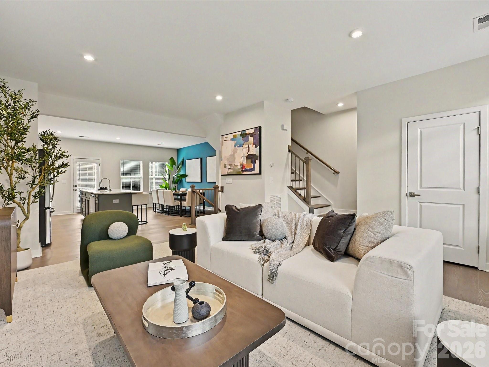 653 Uwharrie River Road Charlotte, NC 28211 - Photo 6 of 29 a living room with furniture and a couches