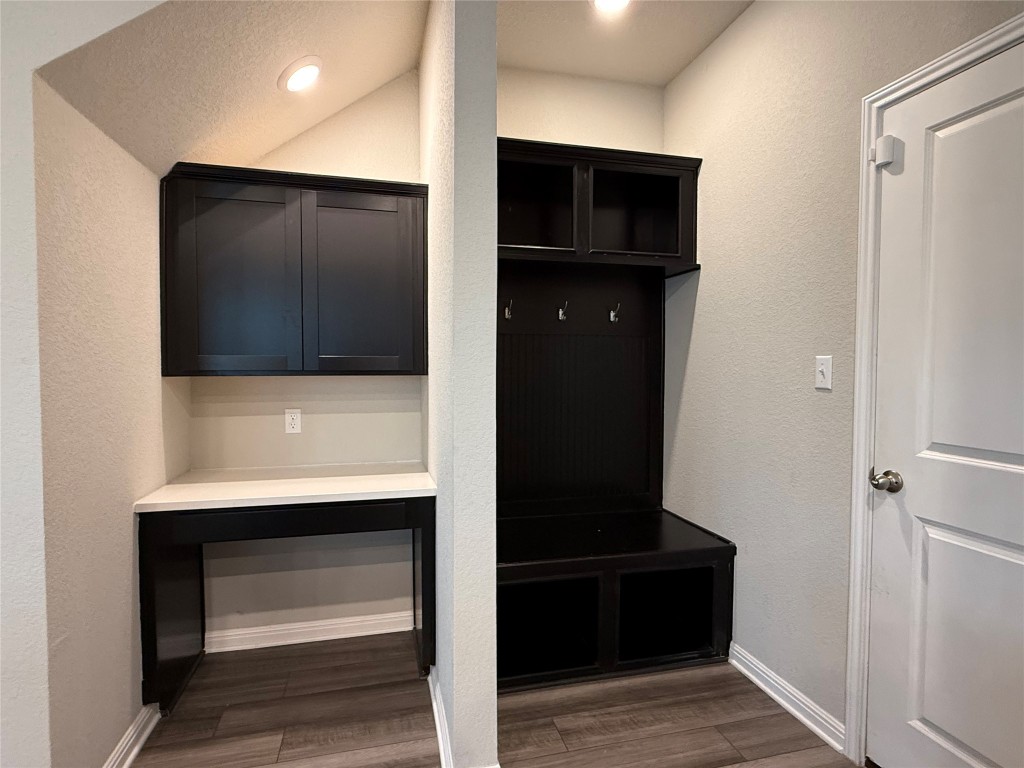 953 Lone Peak Way Dripping Springs, TX 78620 - Photo 12 of 35 Corner Cabinet Space Along the Hallway.