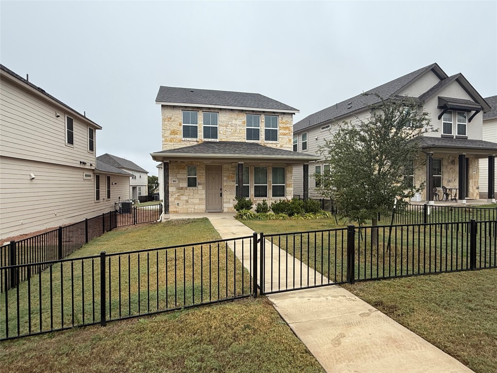 953 Lone Peak Way Dripping Springs, TX 78620 - Photo 2 of 35 Front Of Home Featuring Fenced Yard