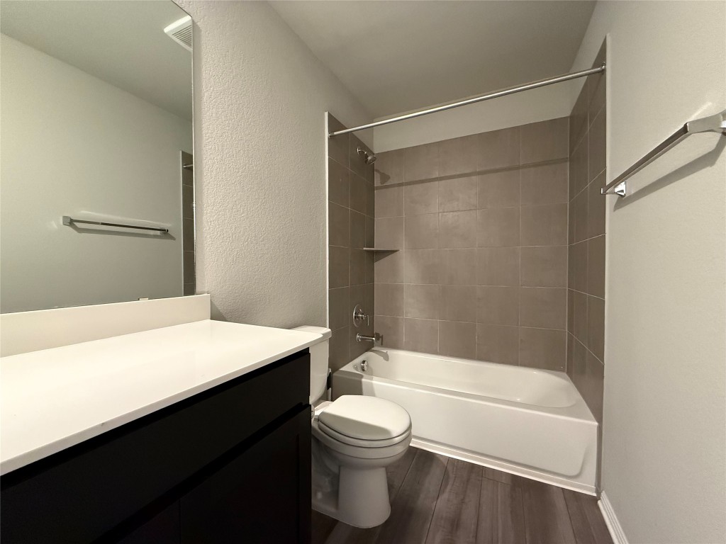 953 Lone Peak Way Dripping Springs, TX 78620 - Photo 24 of 35 Secondary Bathroom with a Combined Shower and Tub