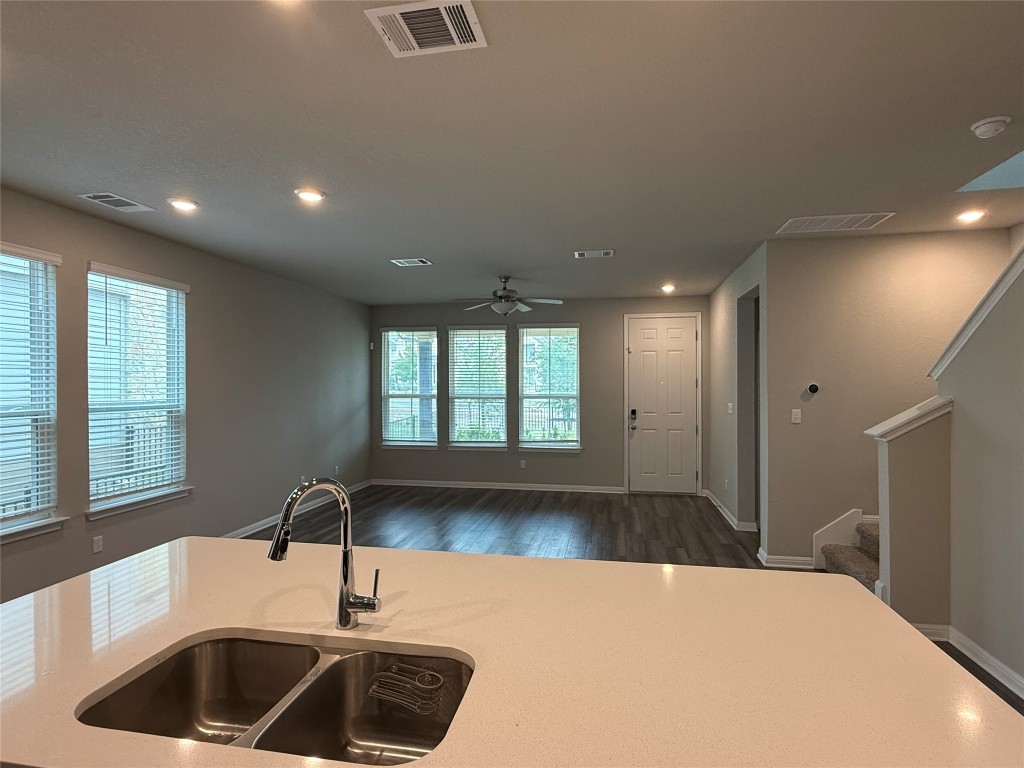 953 Lone Peak Way Dripping Springs, TX 78620 - Photo 10 of 35 Kitchen Island Facing the Living Room