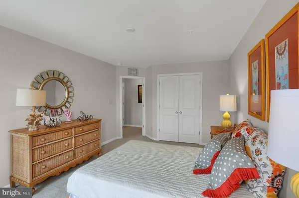 a bathroom with a sink toilet and mirror