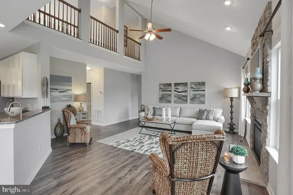 a living room with furniture and a table