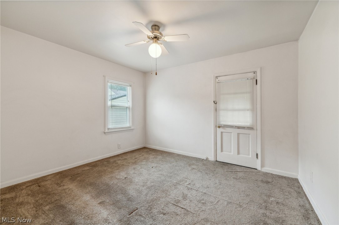 3619 Strathavon Road Cleveland, OH 44120 - Photo 22 of 49 Carpeted empty room featuring ceiling fan
