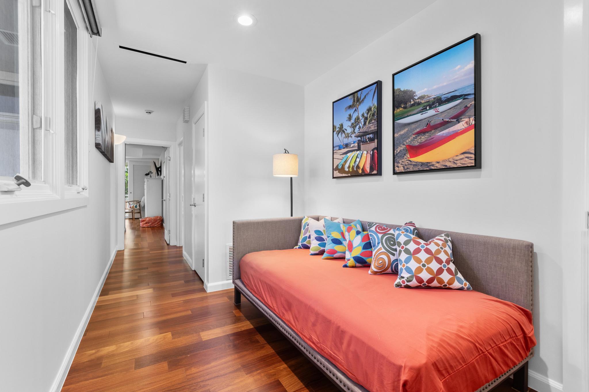 68-1375 Pauoa Road, Unit M4 Kamuela, HI 96743 - Photo 16 of 30 a bed room with a bed and a painting on the wall