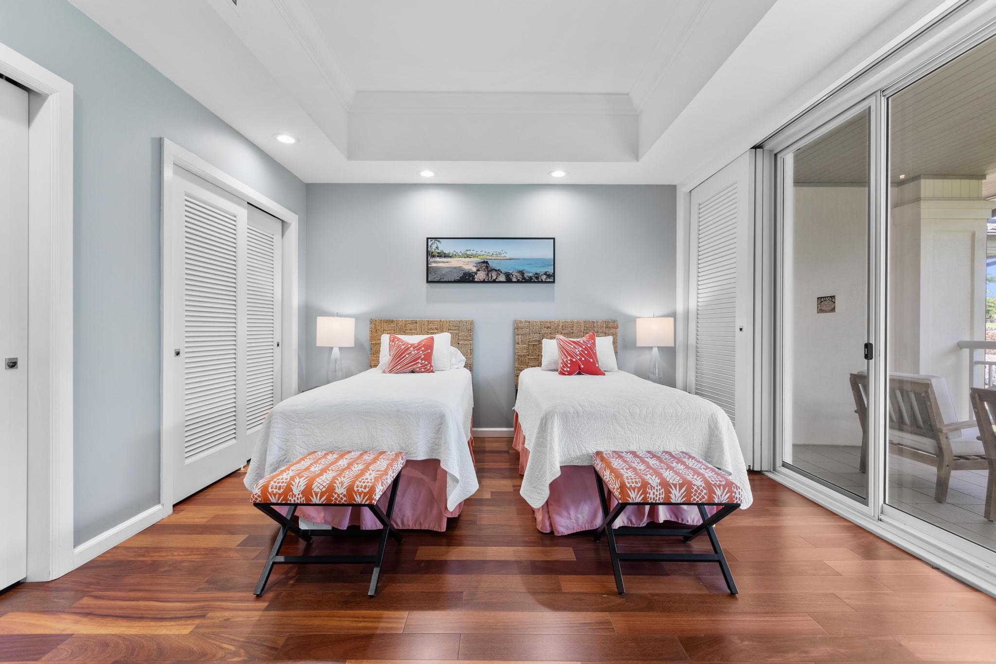 68-1375 Pauoa Road, Unit M4 Kamuela, HI 96743 - Photo 24 of 30 a bedroom with two beds and wooden floor