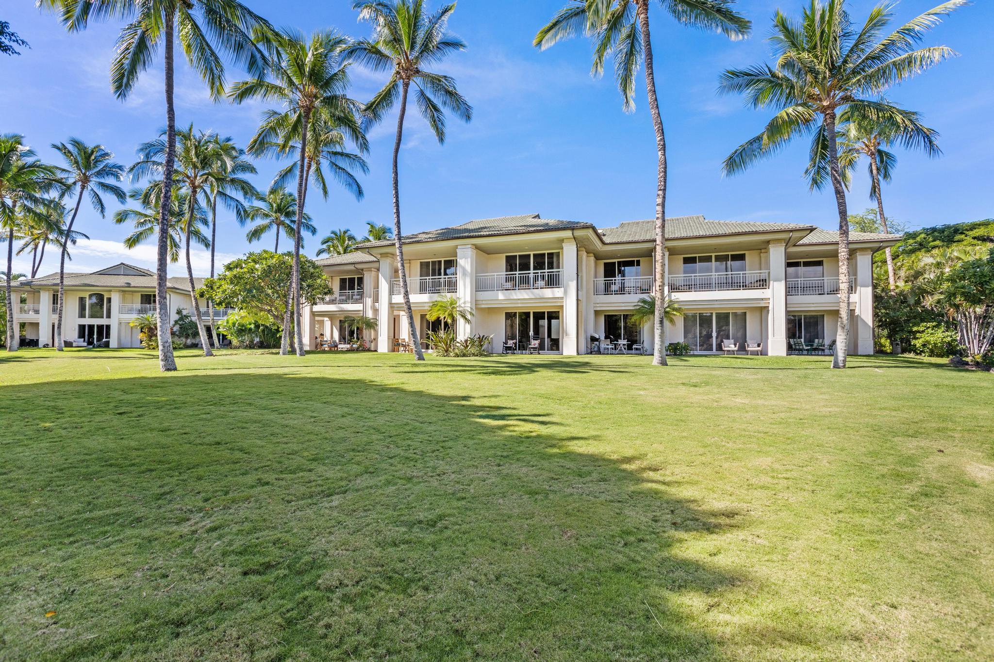 68-1375 Pauoa Road, Unit M4 Kamuela, HI 96743 - Photo 5 of 30 a front view of a house with a garden