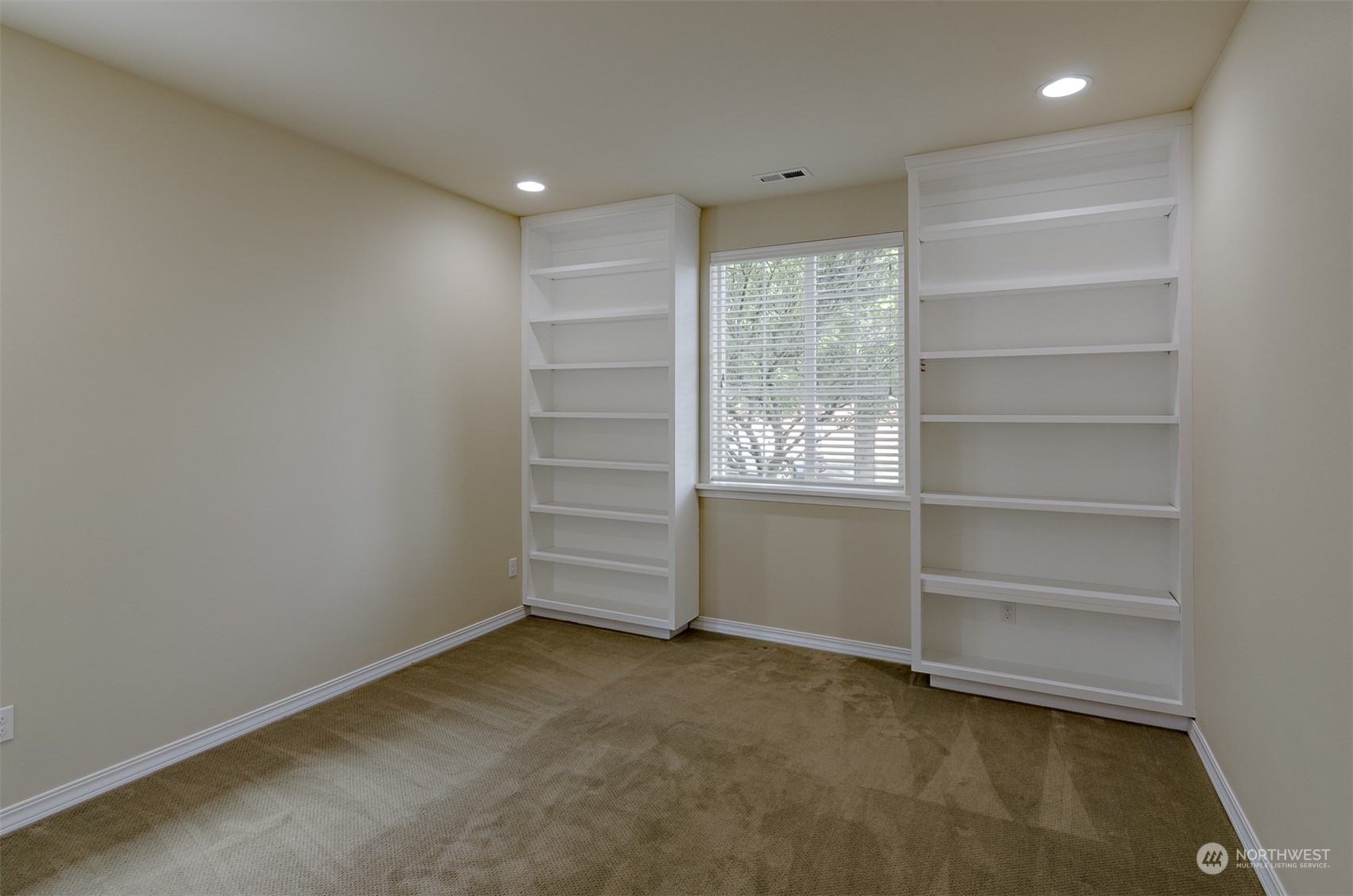 8401 Orcas Loop Northeast Lacey, WA 98516 - Photo 18 of 40 a view of an empty room with a window