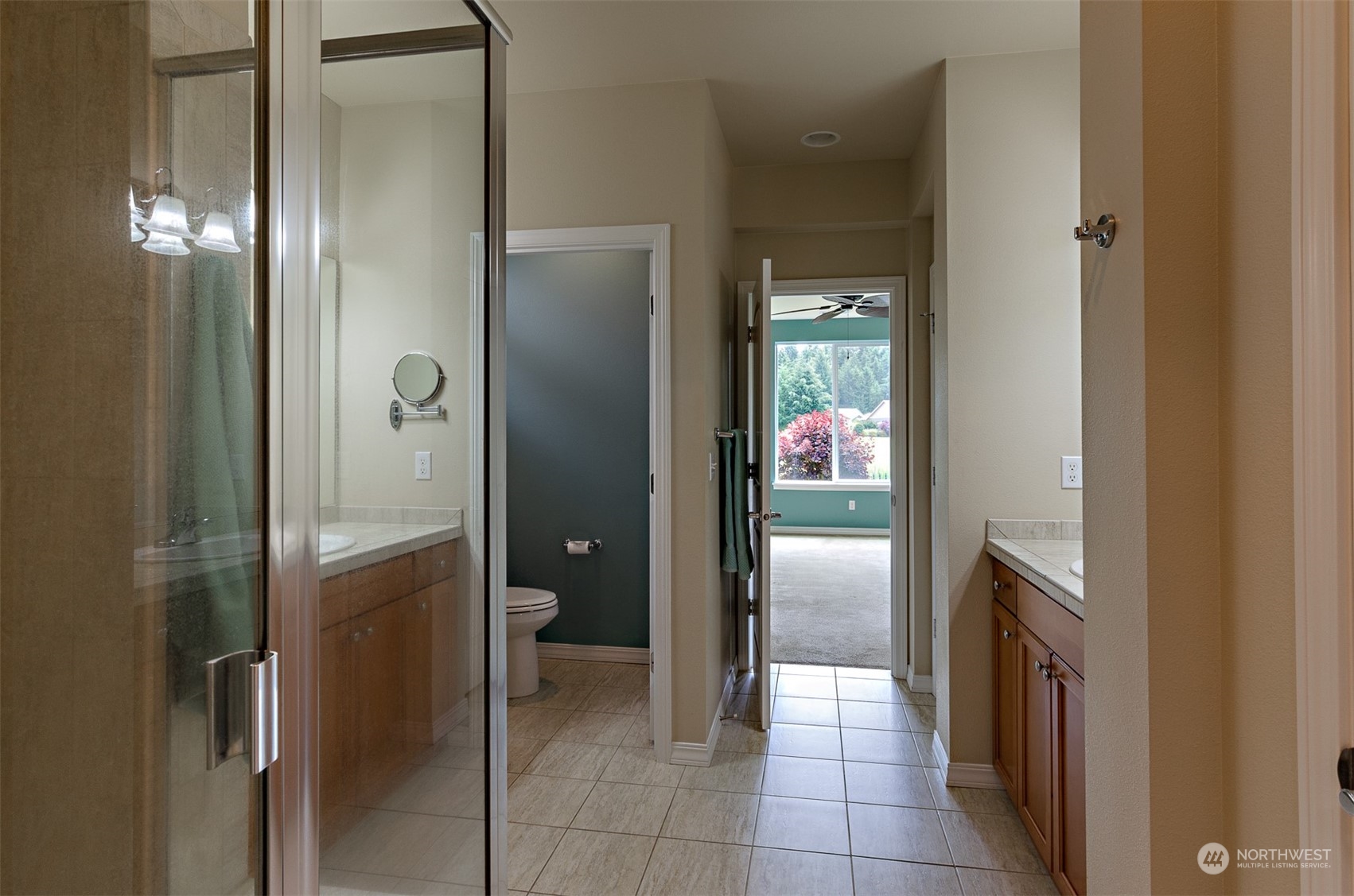 8401 Orcas Loop Northeast Lacey, WA 98516 - Photo 33 of 40 a bathroom with a shower and closet