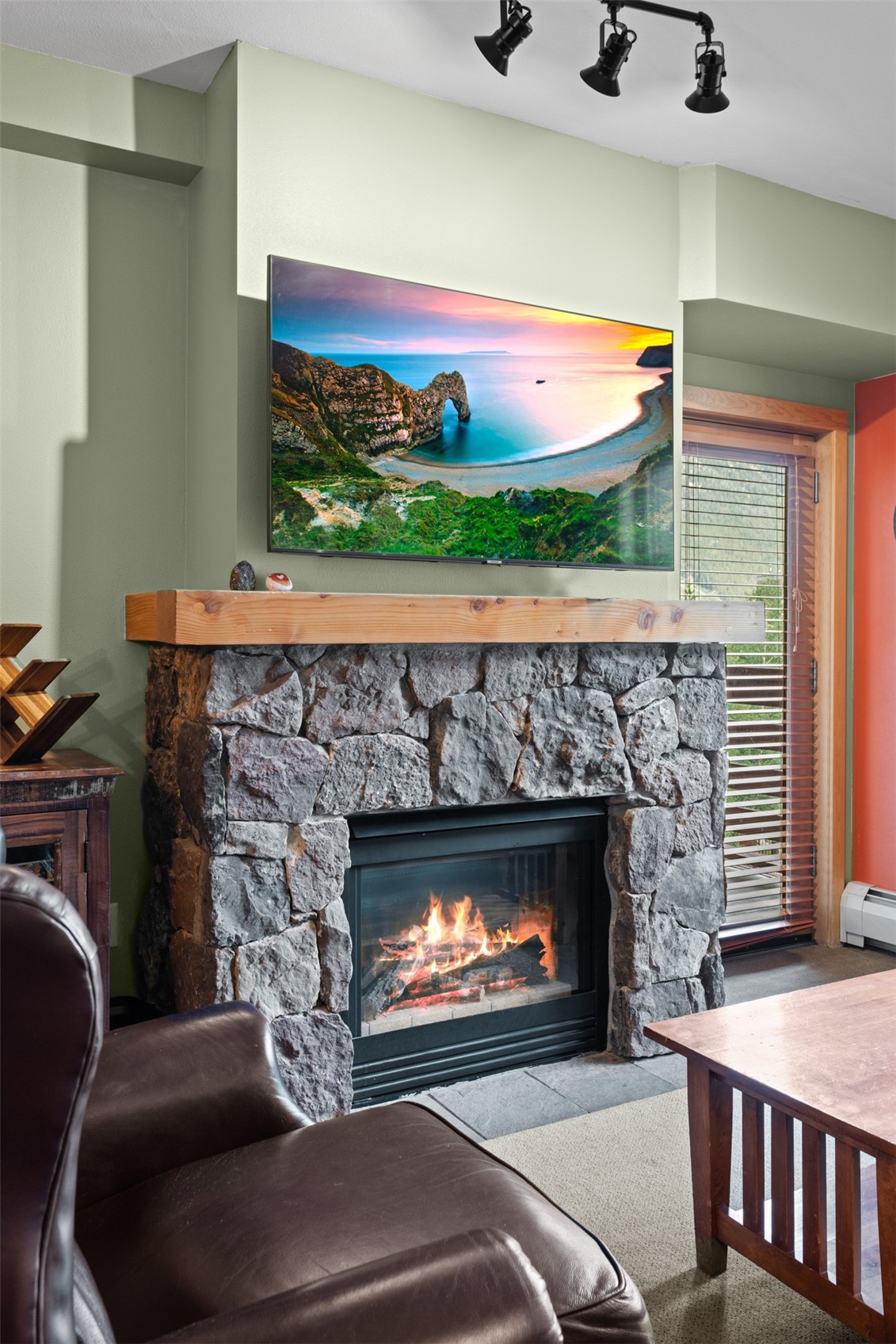 910 Copper Road, Unit 308 Frisco, CO 80443 - Photo 19 of 42 Stone fireplace in living room