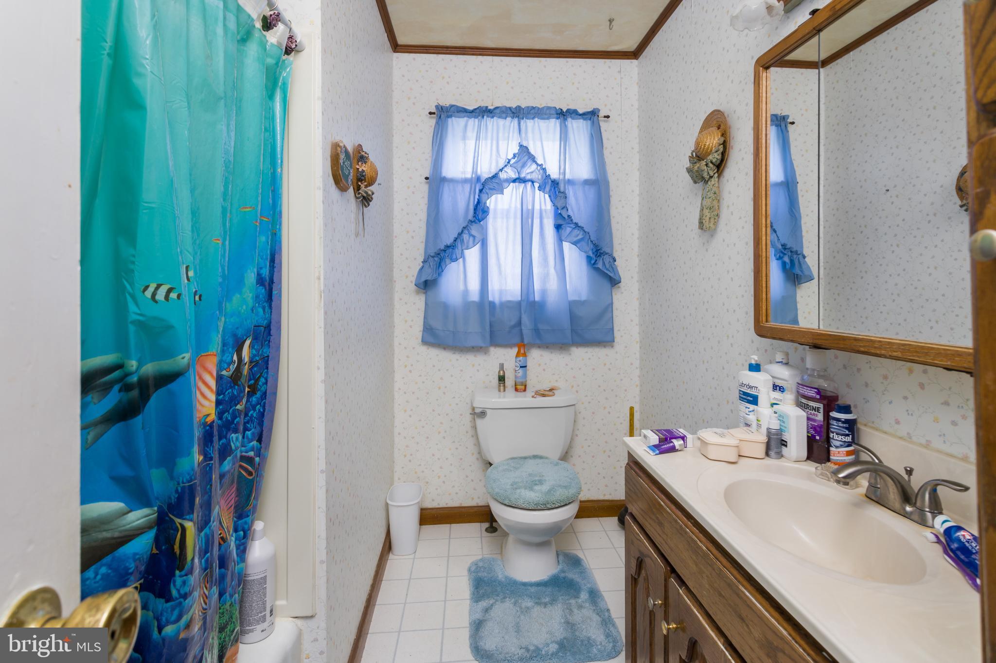 920 Barnt-Deklyn Road Hamilton, NJ 08610 - Photo 13 of 26 a bathroom with a sink toilet and shower