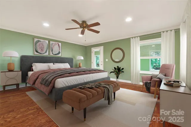 a view of livingroom with hardwood floor and a ceiling fan