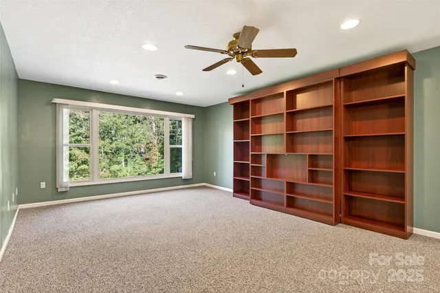 a bathroom with a sink toilet and vanity