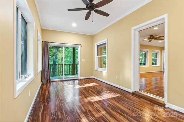 a view of a room with cabinet garage and windows