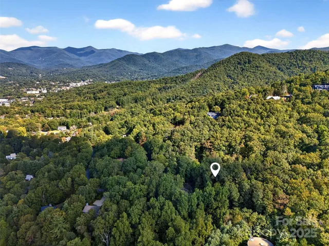 a view of balcony with wooden floor