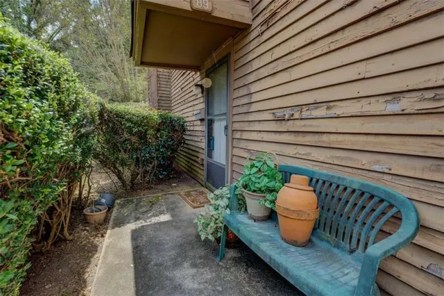 a view of outdoor sitting area with furniture