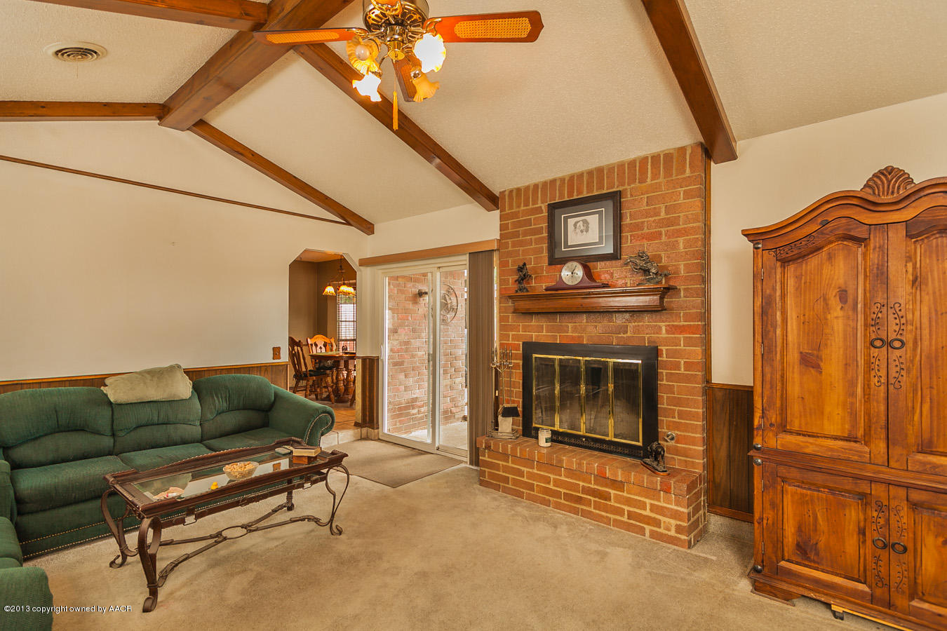 5213 Royce Drive Amarillo, TX 79110 - Photo 10 of 15 a living room with furniture and a fireplace