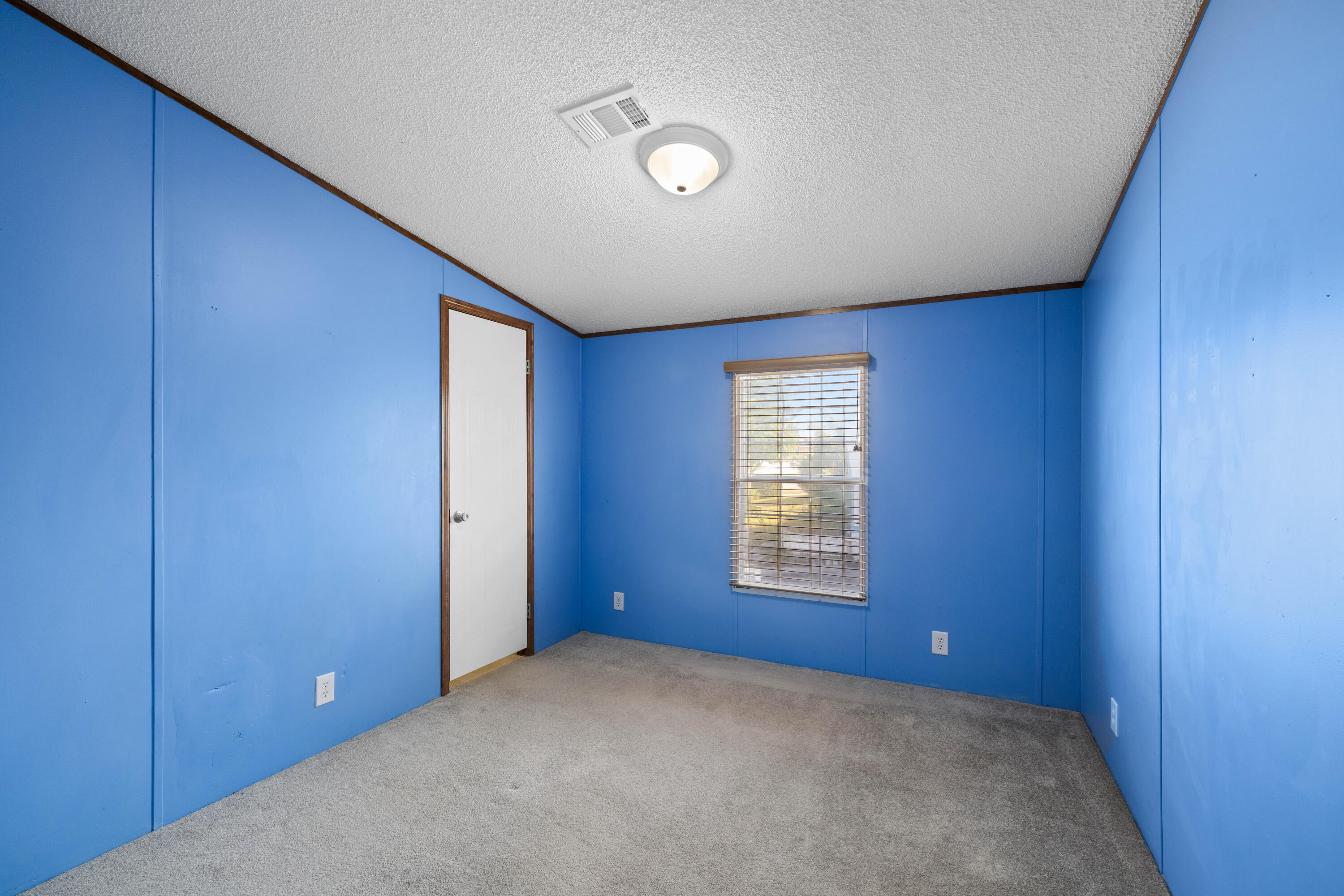7140 Southeast Ridgeway Terrace Hobe Sound, FL 33455 - Photo 13 of 17 Spare bedroom 1