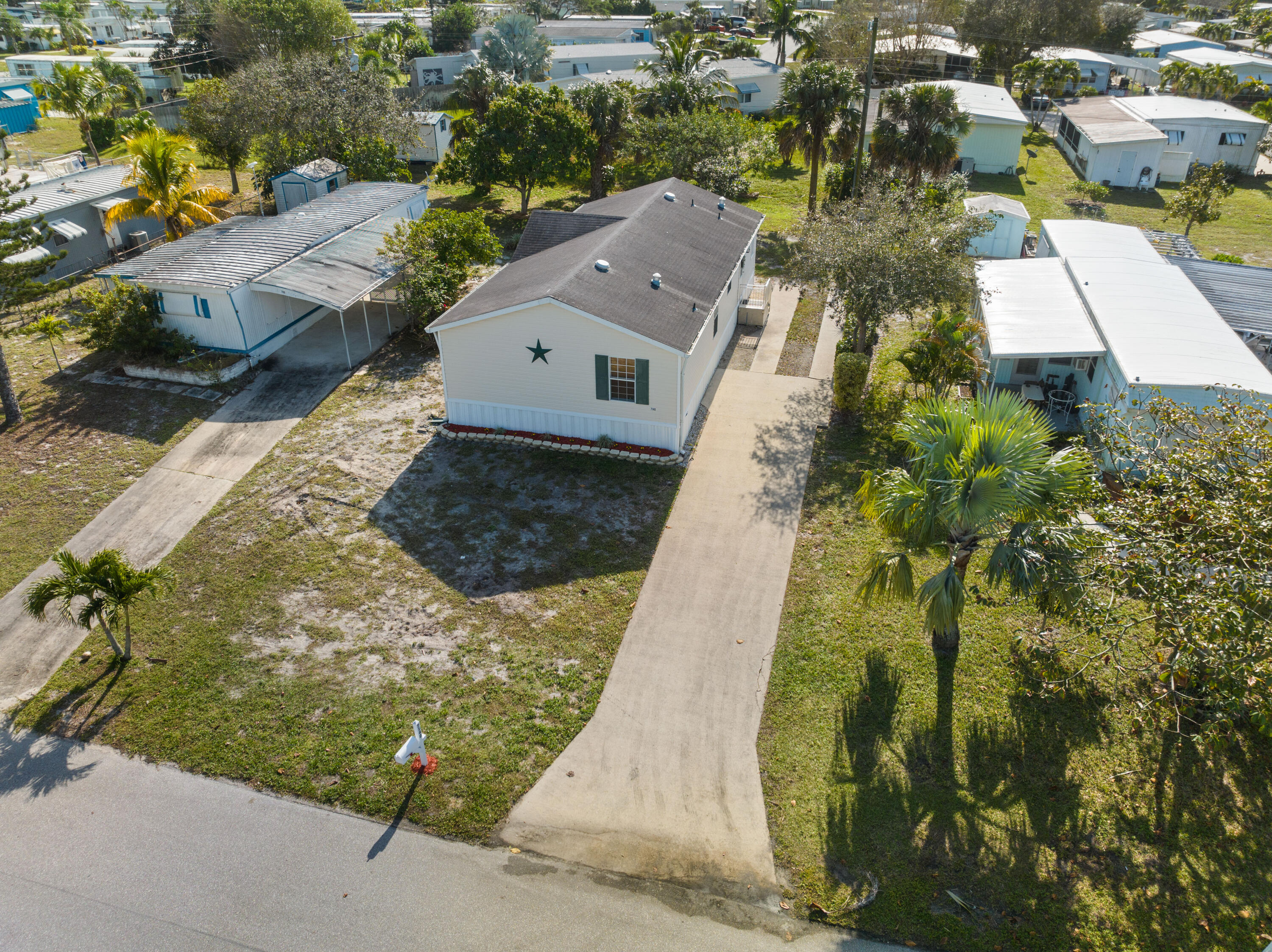 7140 Southeast Ridgeway Terrace Hobe Sound, FL 33455 - Photo 2 of 17 Aerial view from street