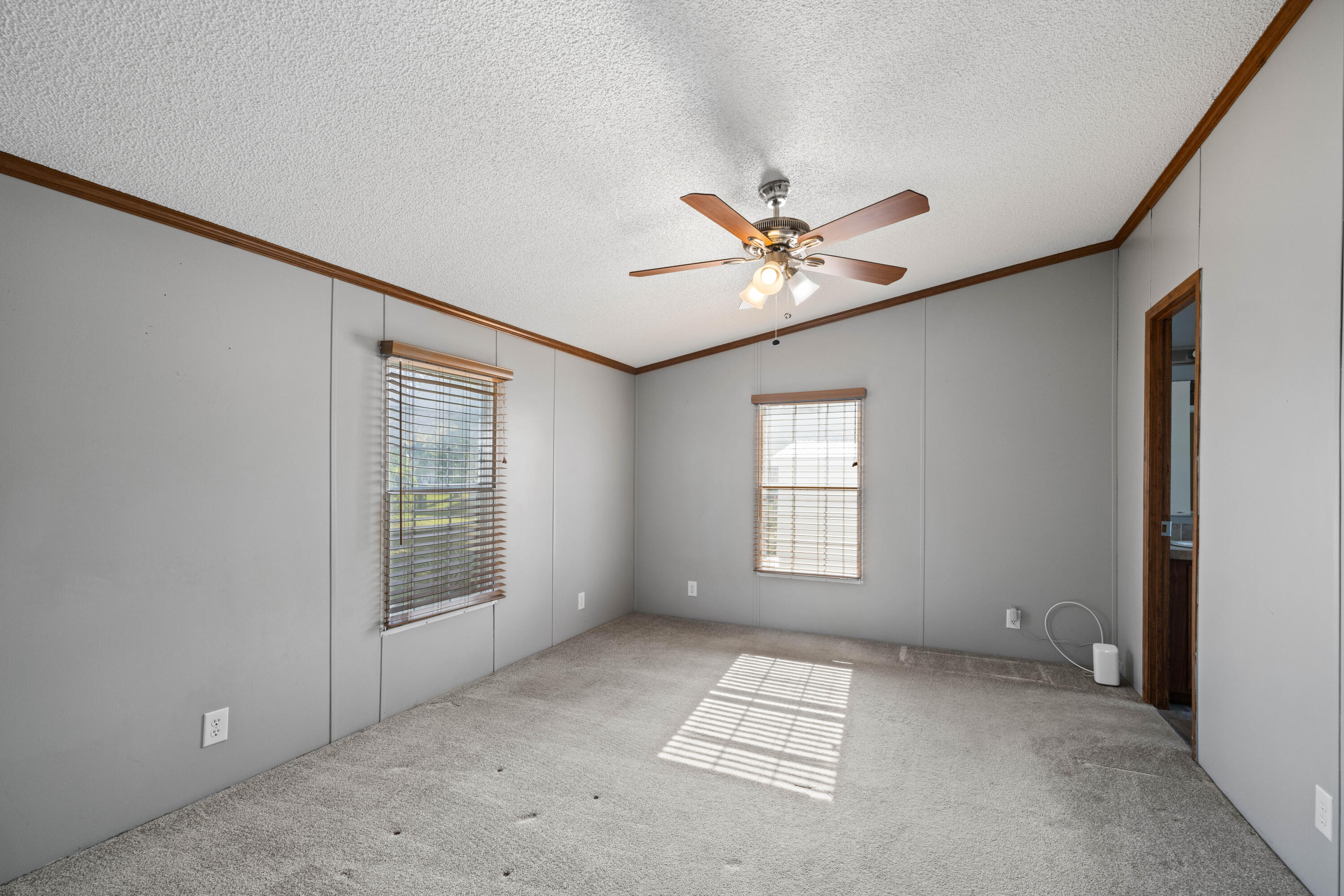 7140 Southeast Ridgeway Terrace Hobe Sound, FL 33455 - Photo 9 of 17 Master bedroom