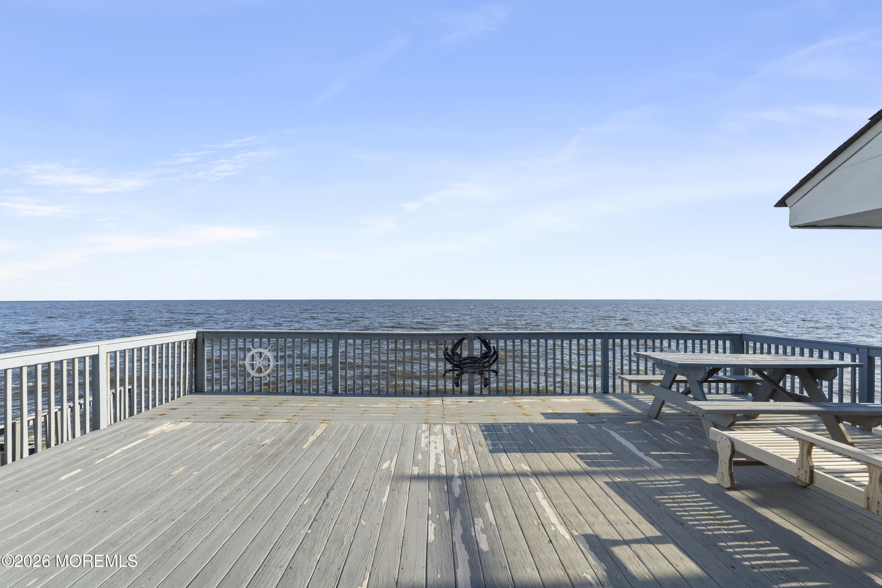 246 Cove Road Newport, NJ 08345 - Photo 16 of 21 a view of a balcony with wooden floor
