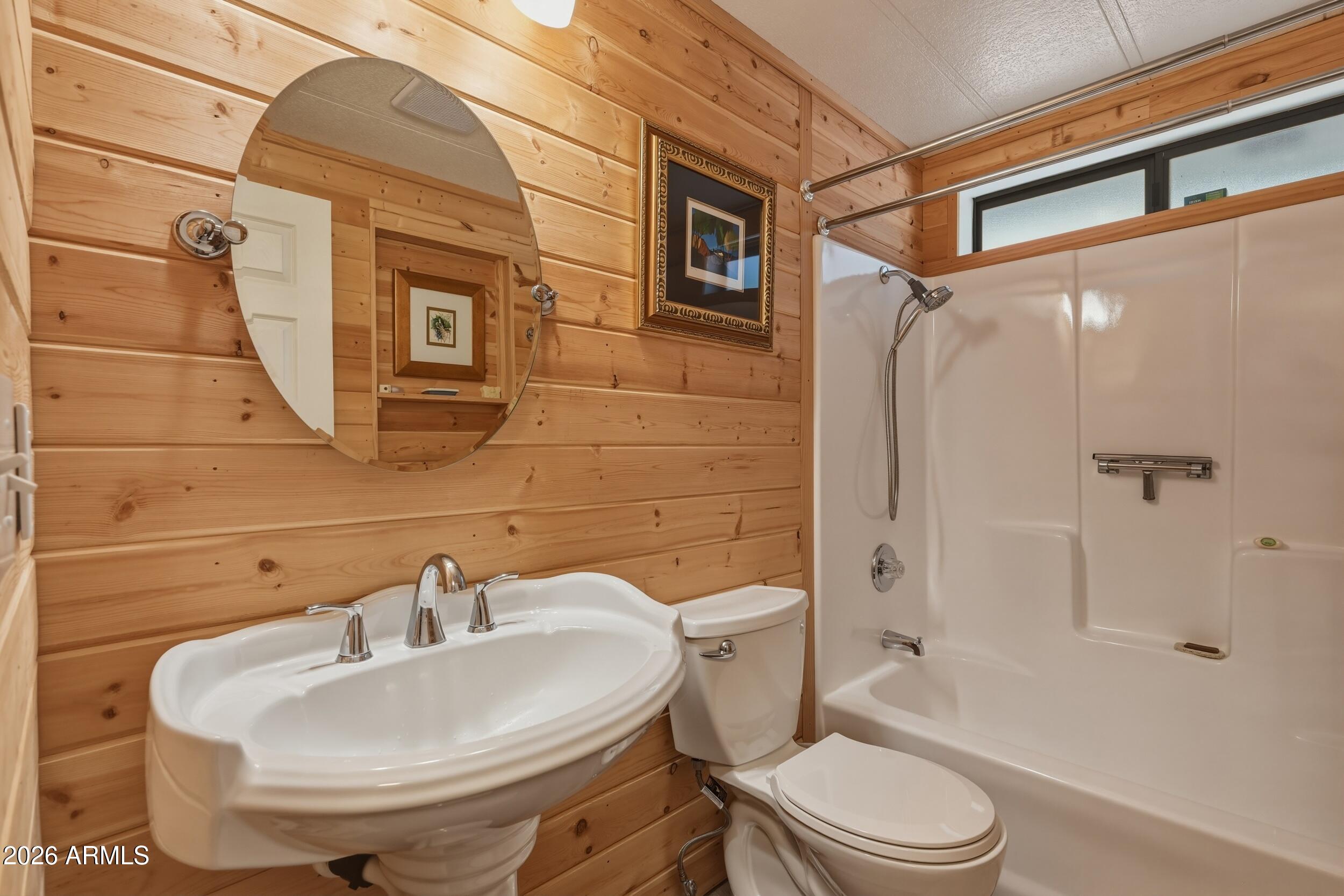 1108 North William Tell Circle Payson, AZ 85541 - Photo 27 of 32 a bathroom with a sink toilet and shower