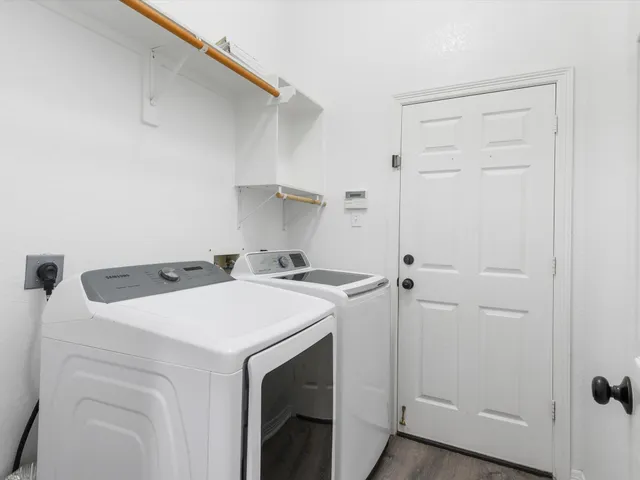 a utility room with dryer and washer