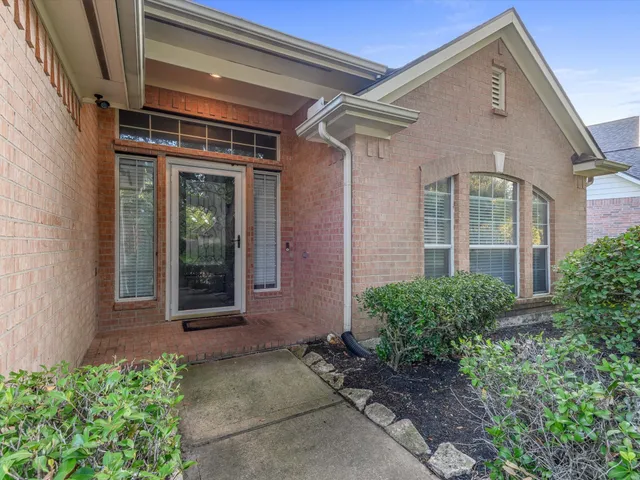 a front view of a house with a porch
